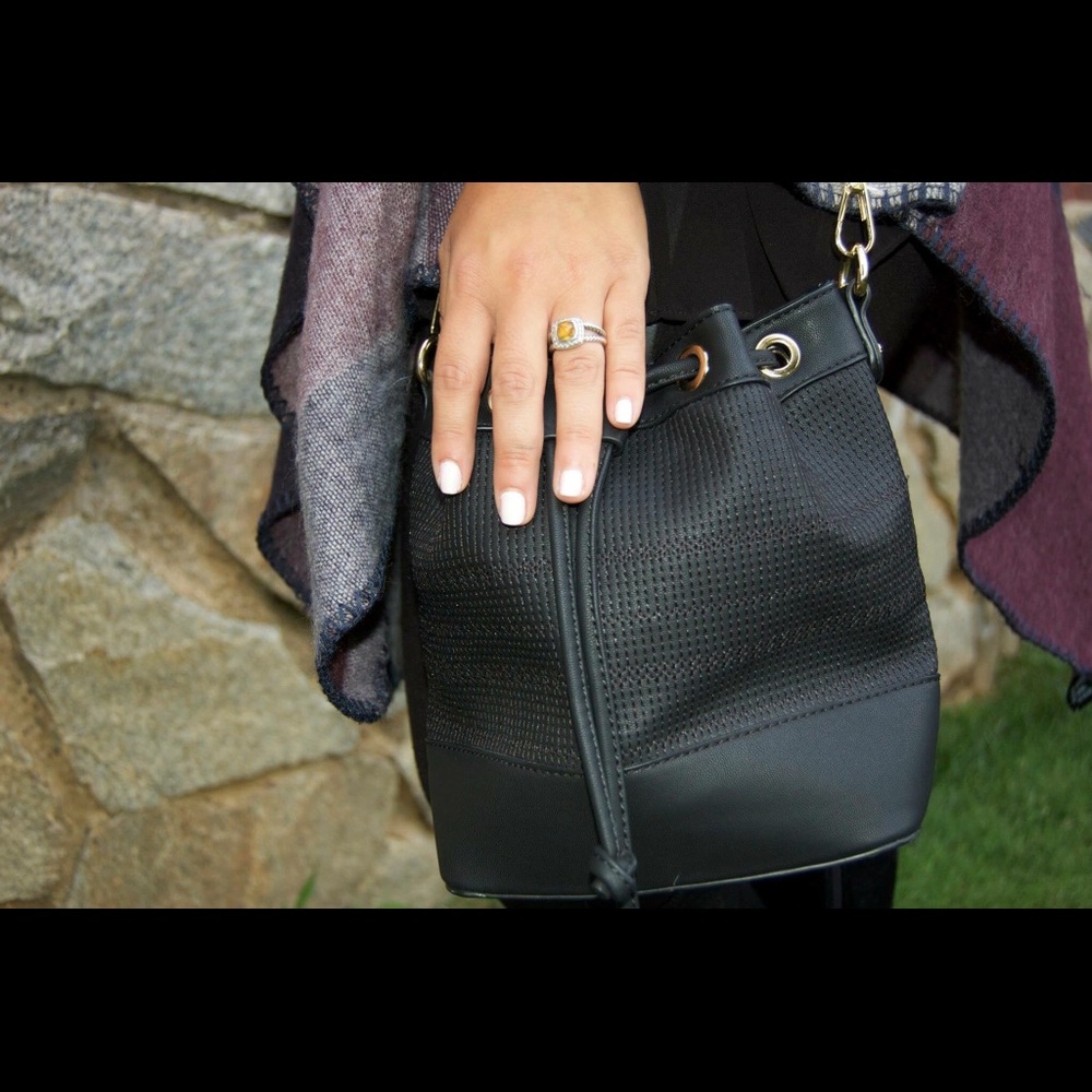 Black faux leather bucket bag